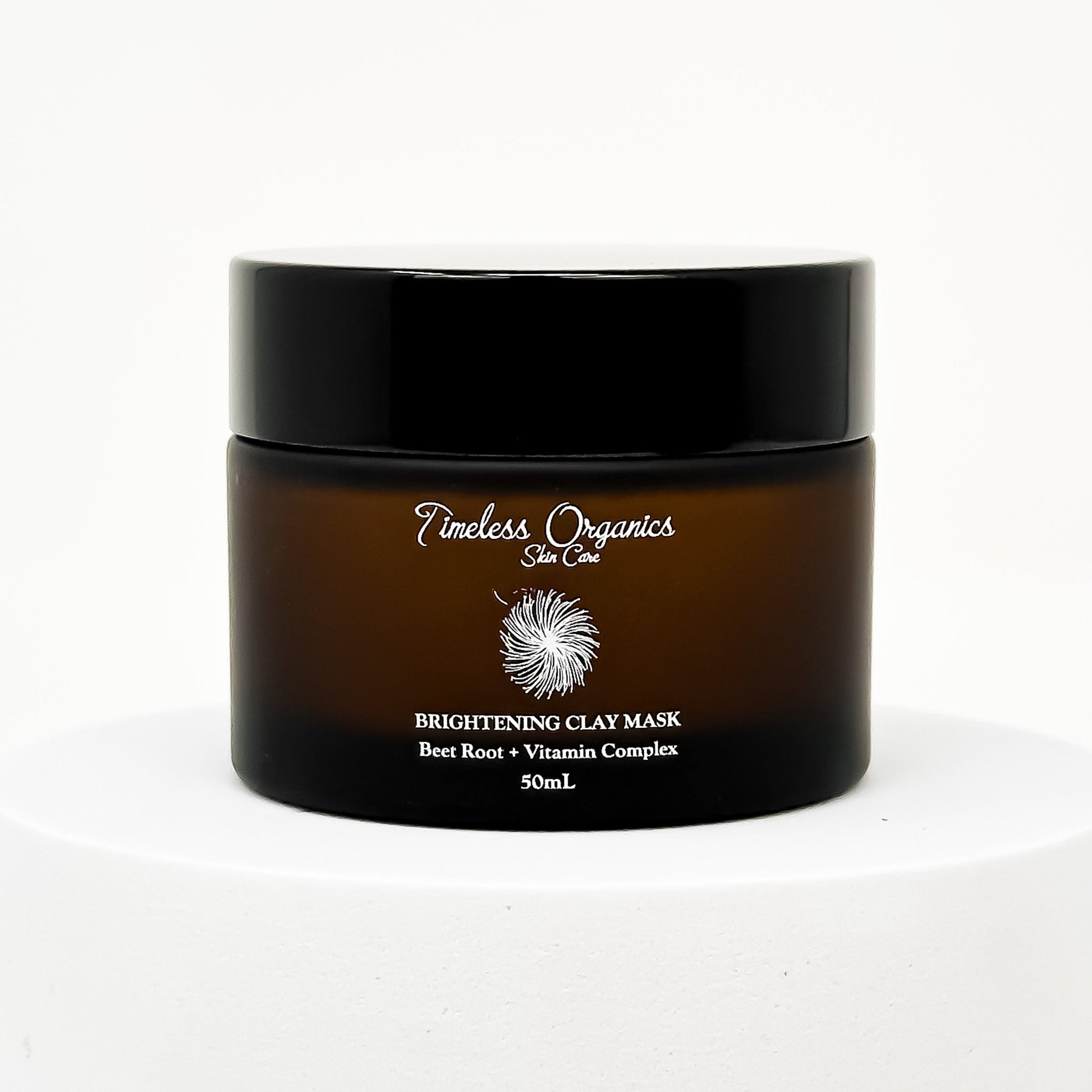 Brightening Clay Mask with beet root and vitamins, 50mL jar for revitalizing and illuminating all skin types.