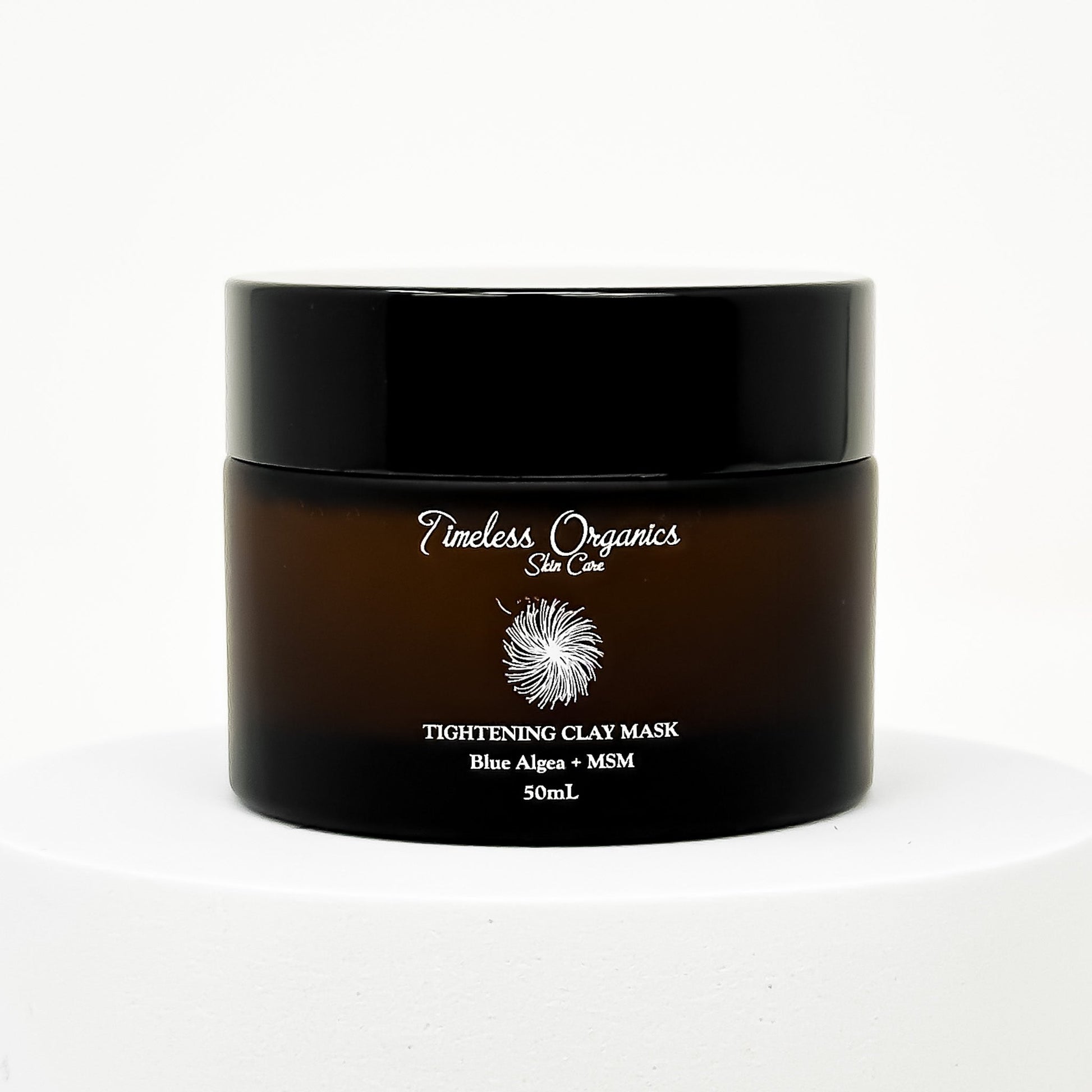 Tightening Clay Mask jar with blue green algae and MSM, 50mL size, designed for refining and tightening maturing skin.