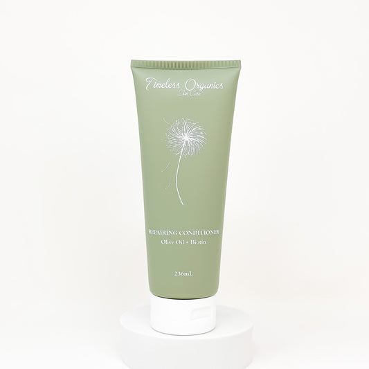 Timeless Organics Repairing Conditioner 236mL bottle for moisturizing and strengthening hair with organic oils, ideal for color-treated hair.