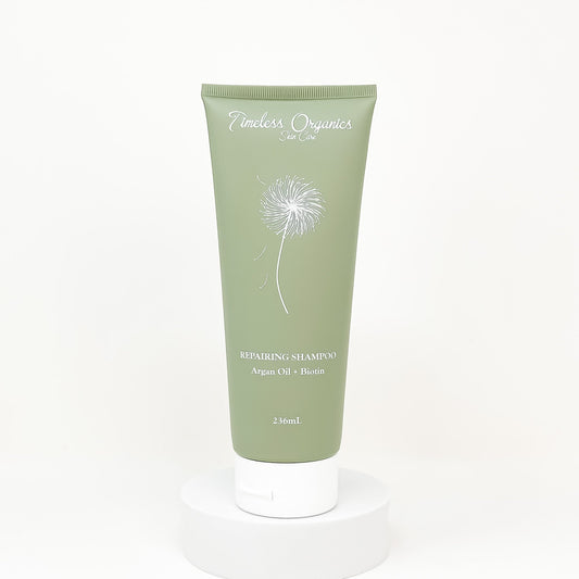Timeless Repairing Shampoo 236mL with argan oil and biotin for all hair types, gentle cleansing and strengthening formula.