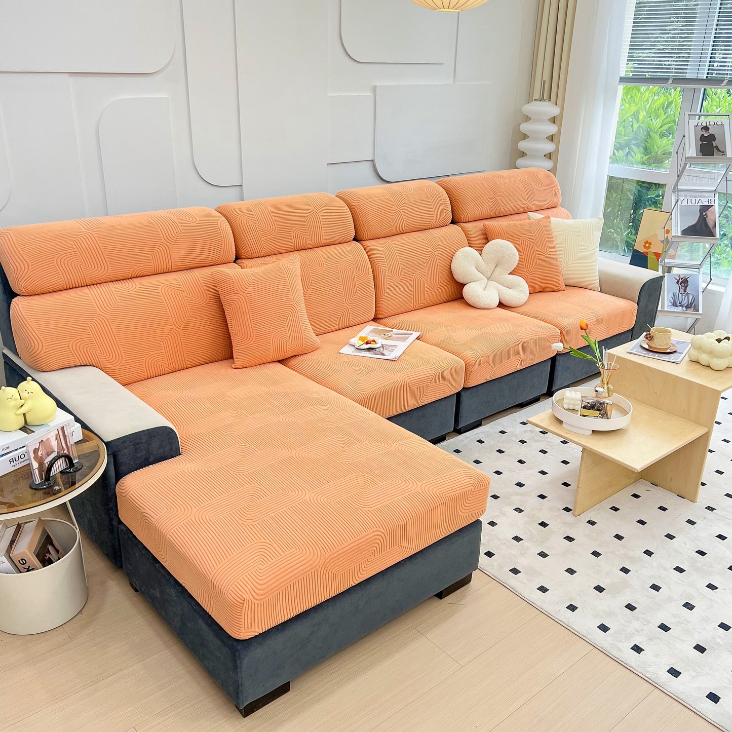 Living room with orange stretch couch cushion covers, washable chaise lounge sofa slipcover, elastic furniture protector for pets, kid