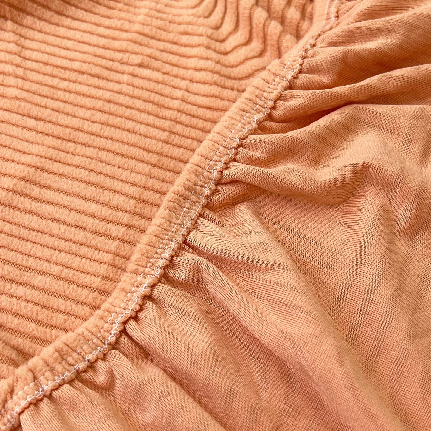 Close-up of high-quality elastic fabric used in Stretch Couch Cushion Covers, Washable Chaise Lounge Sofa Slipcover, Elastic Furniture Protector for Pets, Kid.