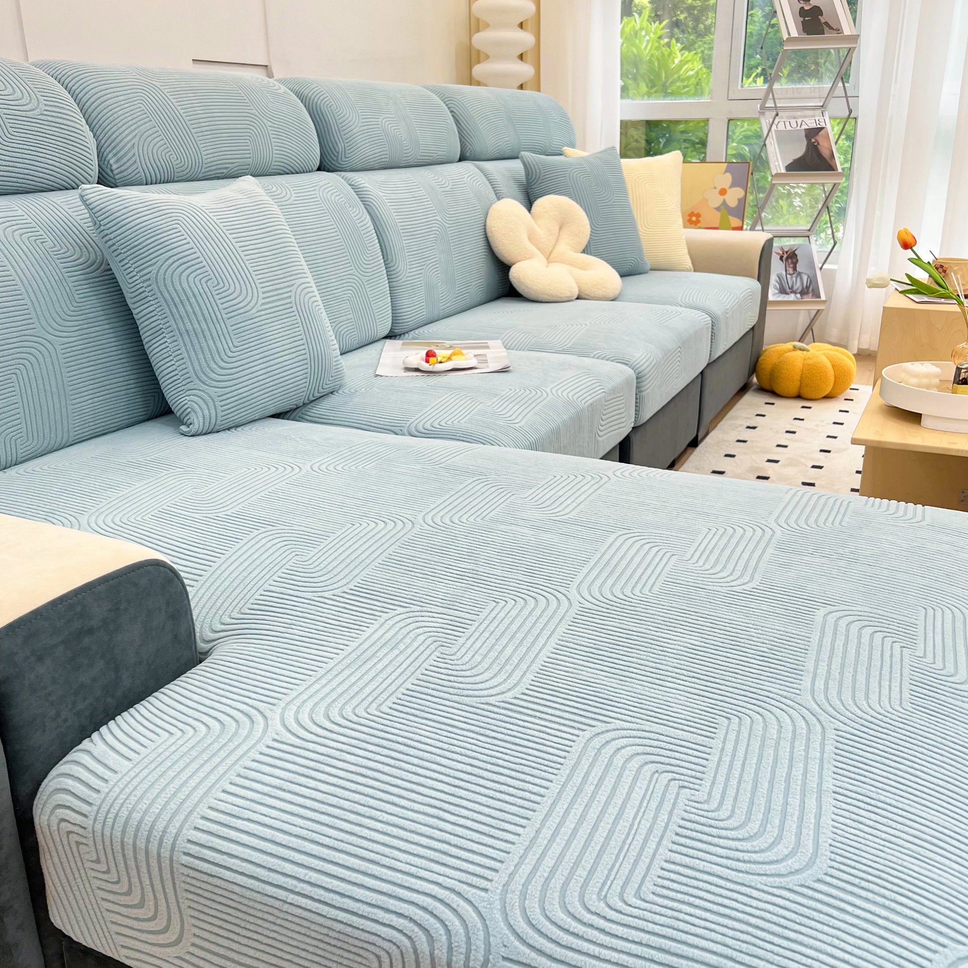 Stretch Couch Cushion Covers, Washable Chaise Lounge Sofa Slipcover, Elastic Furniture Protector for Pets, Kid on a modern sofa.