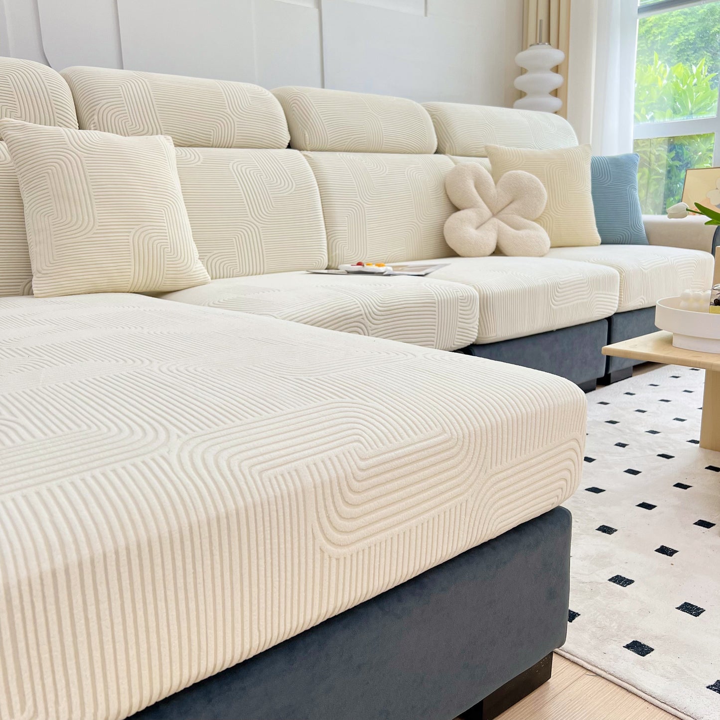 Stretch Couch Cushion Covers, Washable Chaise Lounge Sofa Slipcover, Elastic Furniture Protector for Pets, Kid showcased on a sofa.