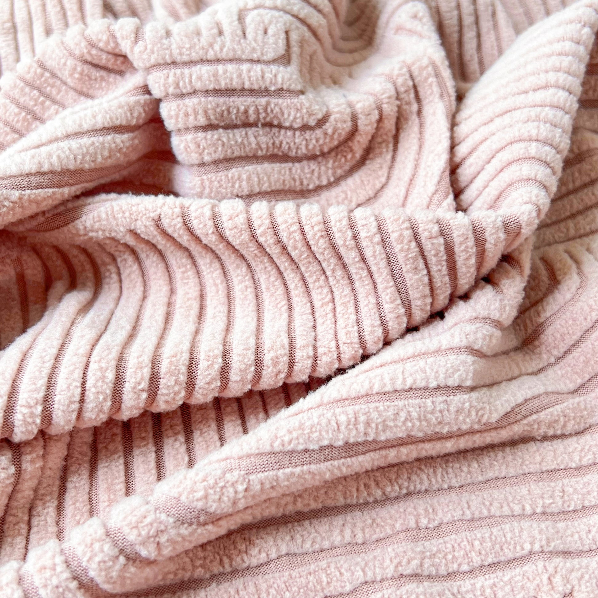 Close-up of textured pink fabric for Stretch Couch Cushion Covers, Washable Chaise Lounge Sofa Slipcover, Elastic Furniture Protector for Pets, Kid