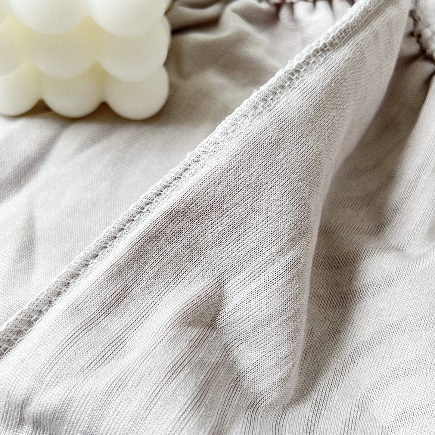 Close-up of Stretch Couch Cushion Covers fabric detail, Washable Chaise Lounge Sofa Slipcover, Elastic Furniture Protector for Pets, Kid.