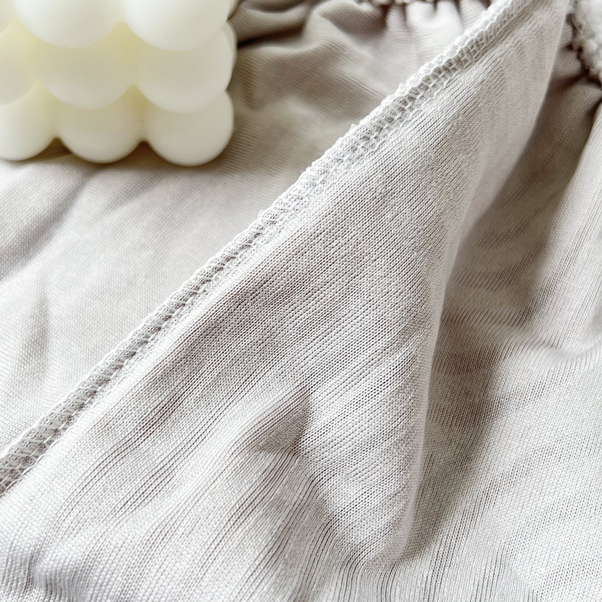 Close-up of Stretch Couch Cushion Covers fabric detail, Washable Chaise Lounge Sofa Slipcover, Elastic Furniture Protector for Pets, Kid.