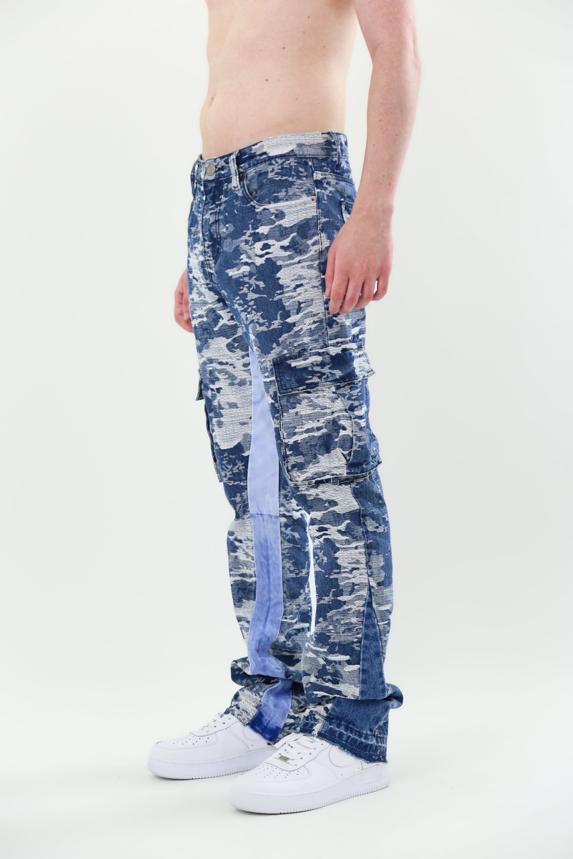 Model wearing AJS695 BLUE CARGO JACQUARD STACKED JEANS with mid-rise waist and non-stretchy fabric.