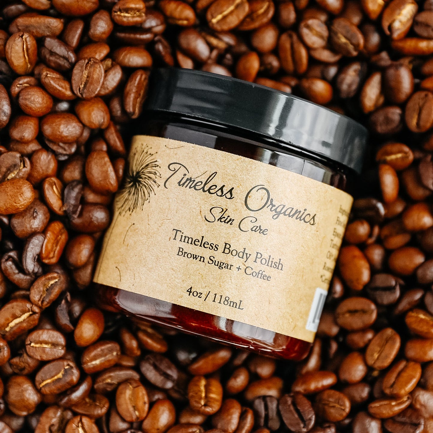 Timeless Organics Skin Care Timeless Body Polish Brown Sugar Coffee jar on coffee beans.