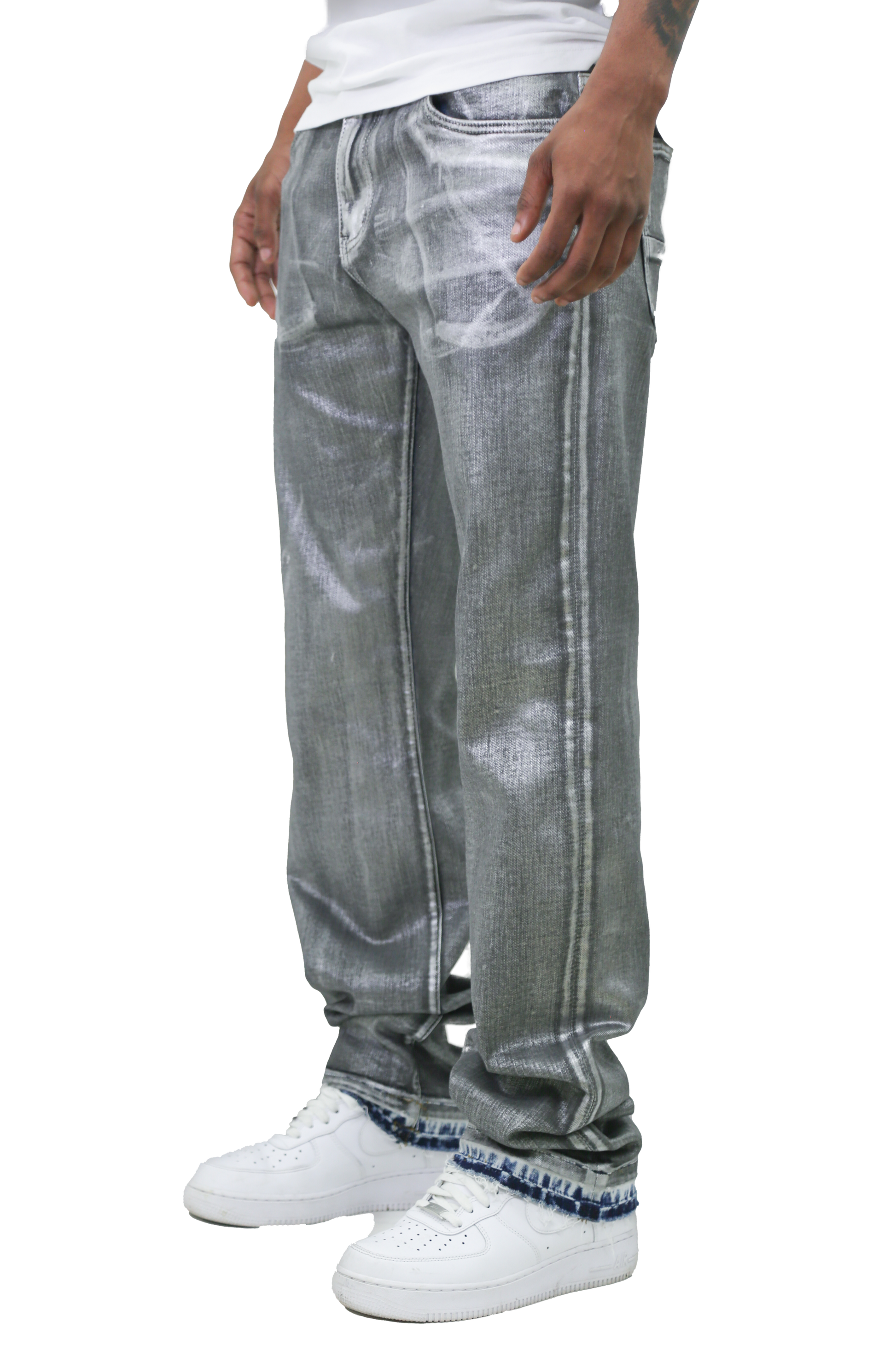 Person wearing METALLIC PRINTED STACKED JEANS AJ07C with white sneakers.