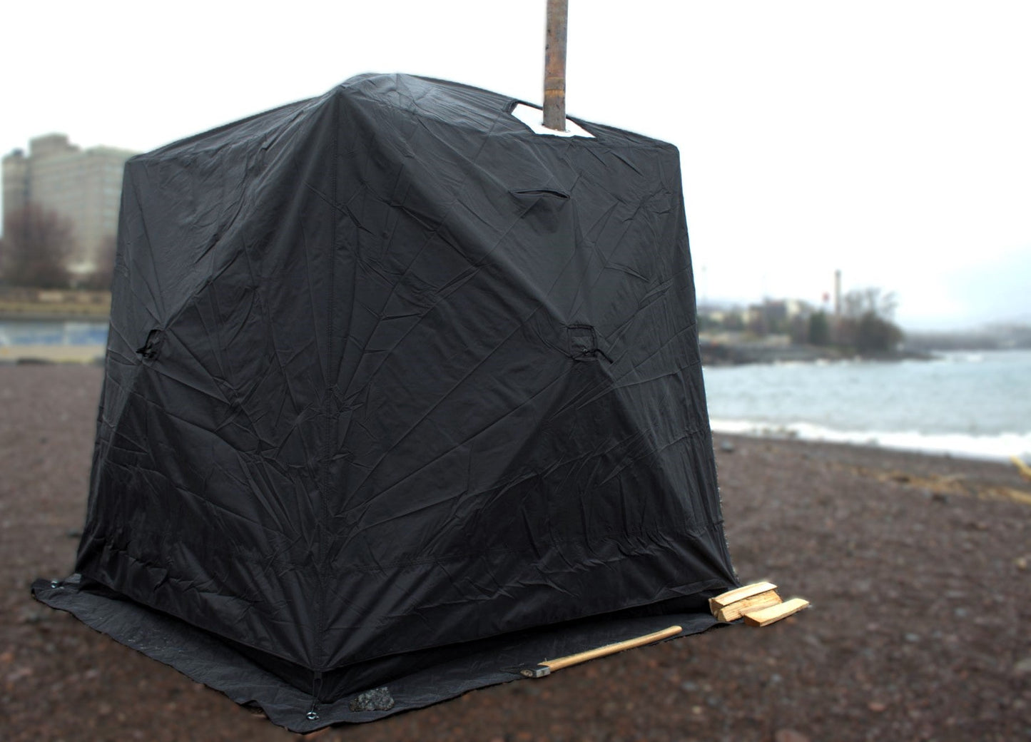 Full Cover for Nova 4 Sauna Tent providing rain protection with window, installed on beach - durable and weather-resistant design