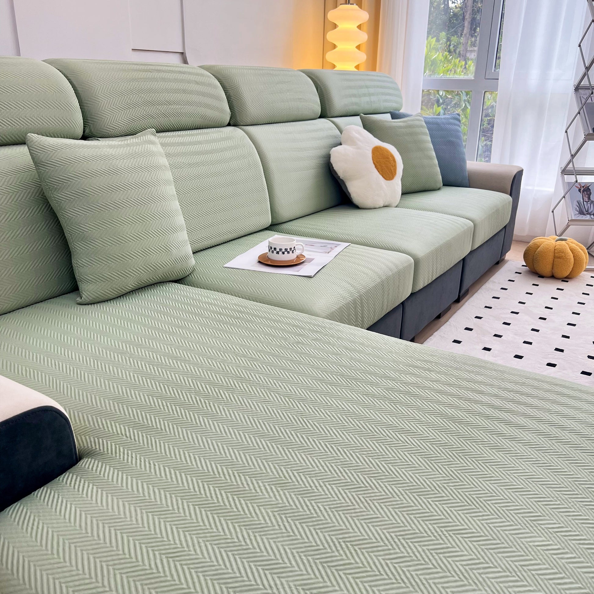 Cooling Stretchy Replacement Couch Cushion Covers for Sectional, Individual Couch Seat Cushion Covers on a green sofa