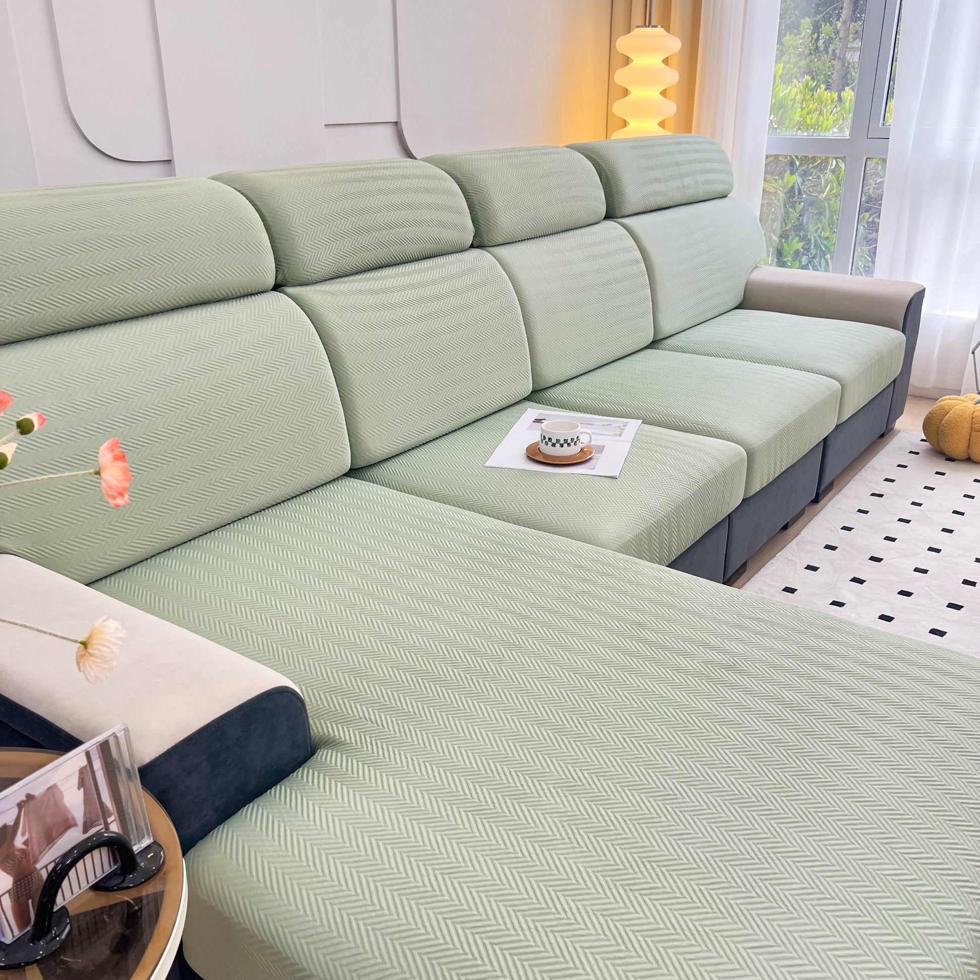 Cooling Stretchy Replacement Couch Cushion Covers for Sectional shown on a modern sofa, made from cooling ice silk fabric.