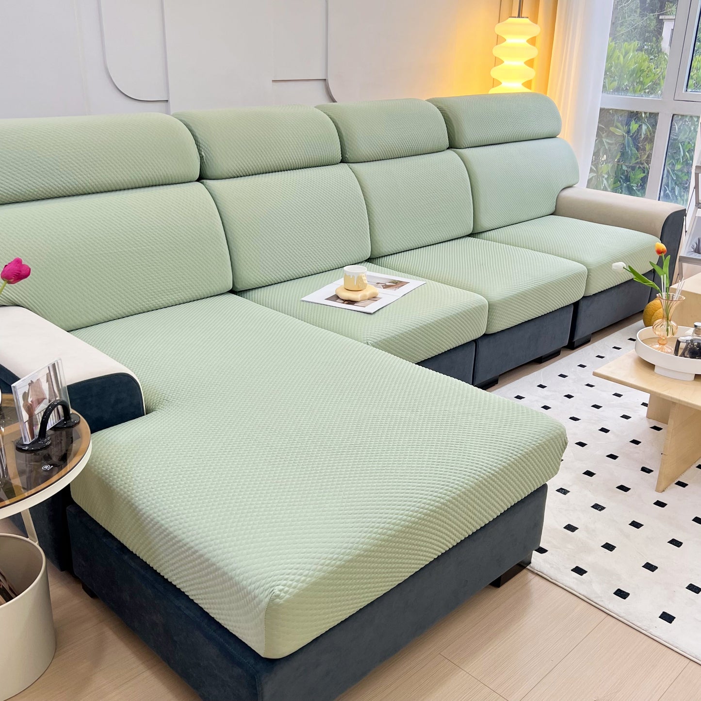 Cooling Stretch Sofa Seat Cushion Covers on green sectional couch, showcasing universal couch cushion protector in living room setting.