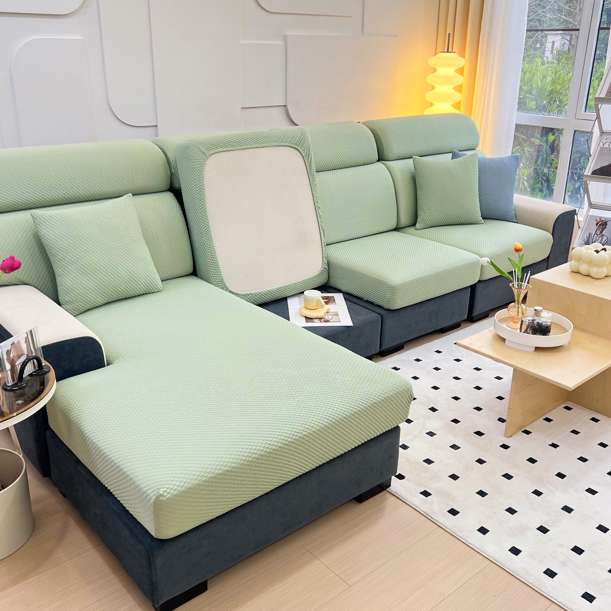 Living room with light green Cooling Stretch Sofa Seat Cushion Covers on an L-shaped couch