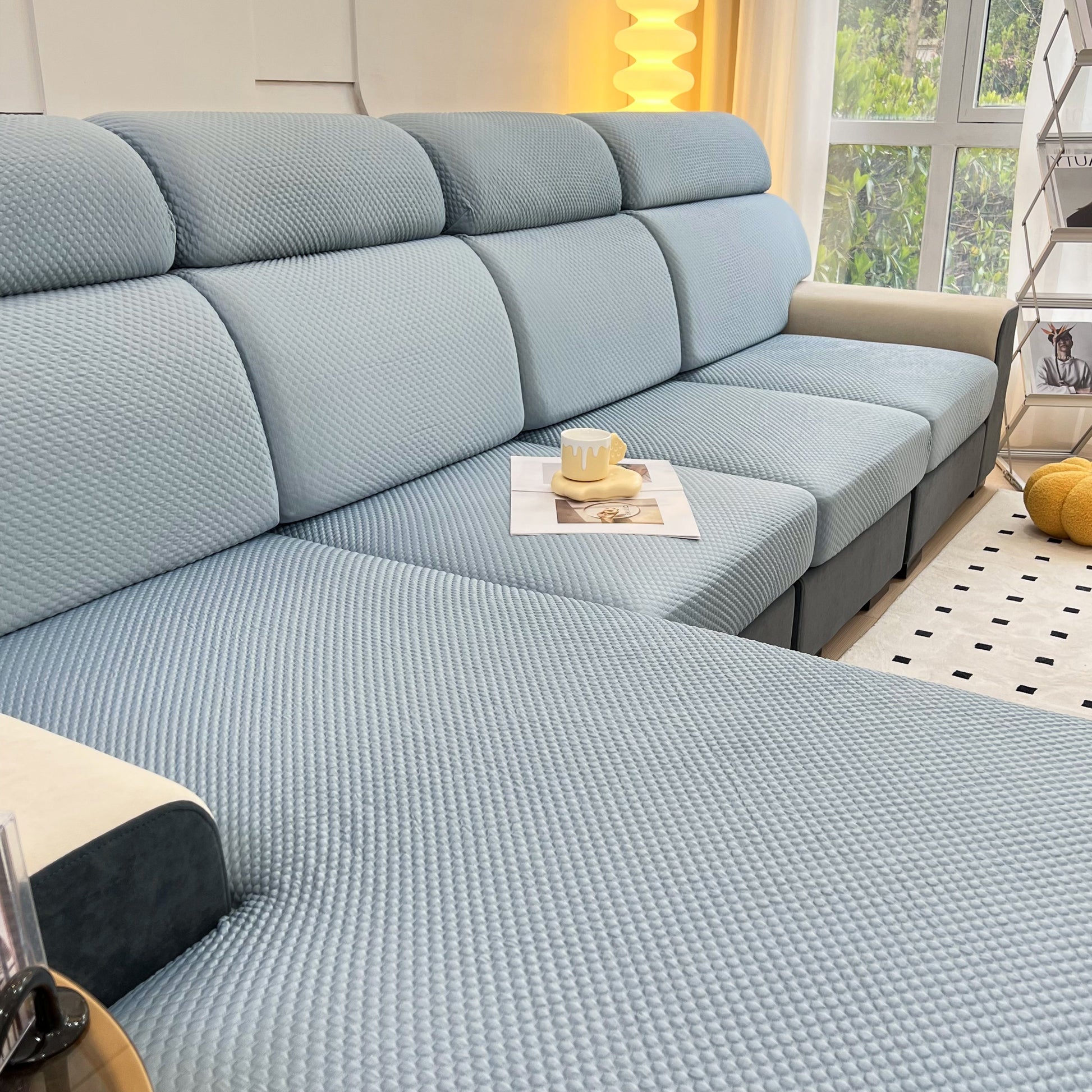 Cooling Stretch Sofa Seat Cushion Covers, Slip Covers for Cushions, Universal Couch Cushion Protector on a grey sofa