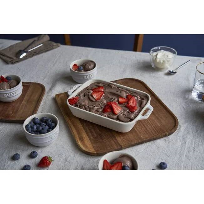 2 Piece Ceramic Stoneware Baking Dish Set in Ivory Cream Beige with chocolate dessert and berries on wooden table