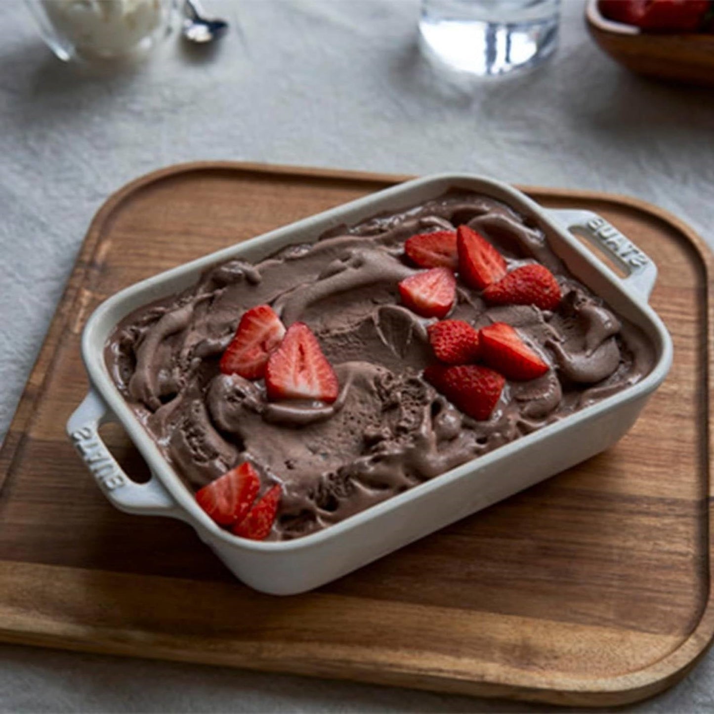 2 Piece Ceramic Stoneware Baking Dish Set in Ivory Cream Beige with chocolate dessert topped with strawberries