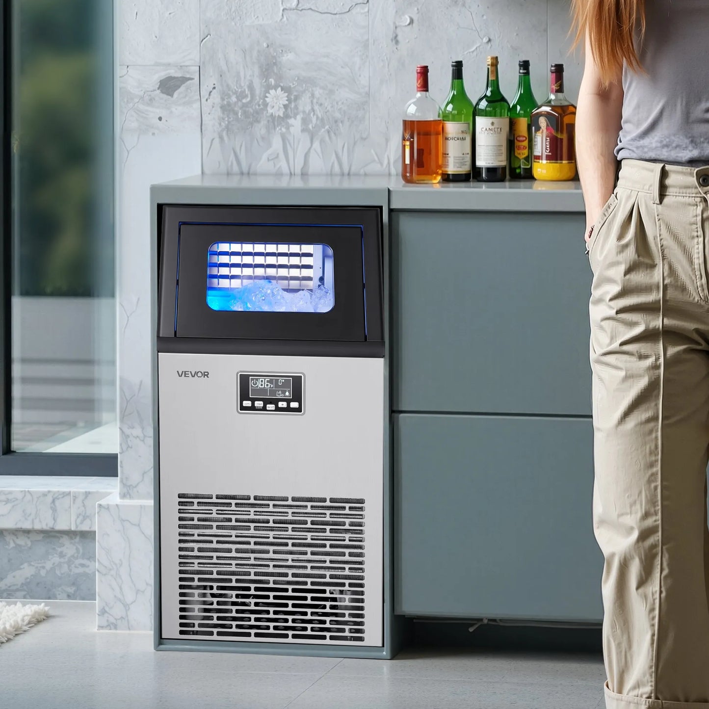 VEVOR Commercial Ice Maker – 100 lbs/24h, 28 lb Storage installed in a modern kitchen setting
