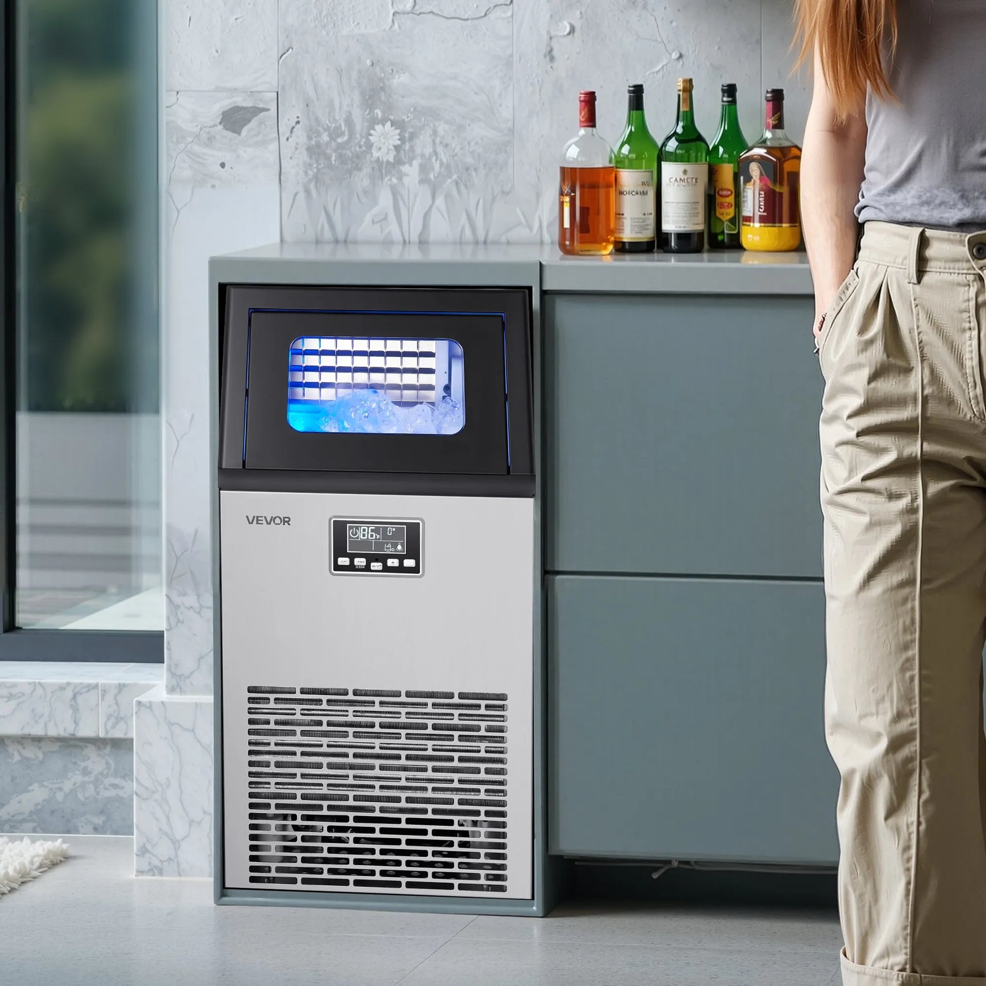 VEVOR Commercial Ice Maker – 100 lbs/24h, 28 lb Storage installed in a modern kitchen setting