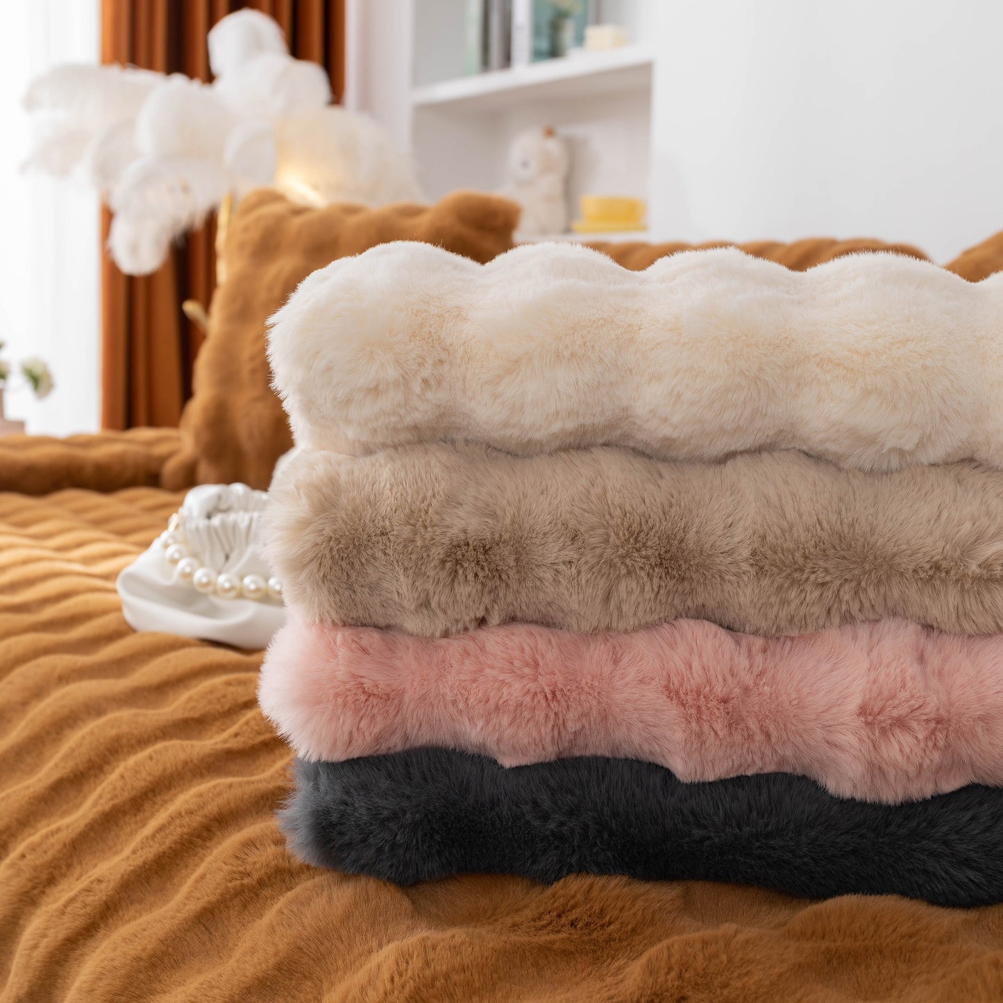 Thick Sofa Cushion Solid Color Faux Fur Fluffy Sofa Cushion Non-Slip Couch Covers in assorted colors stacked on a sofa