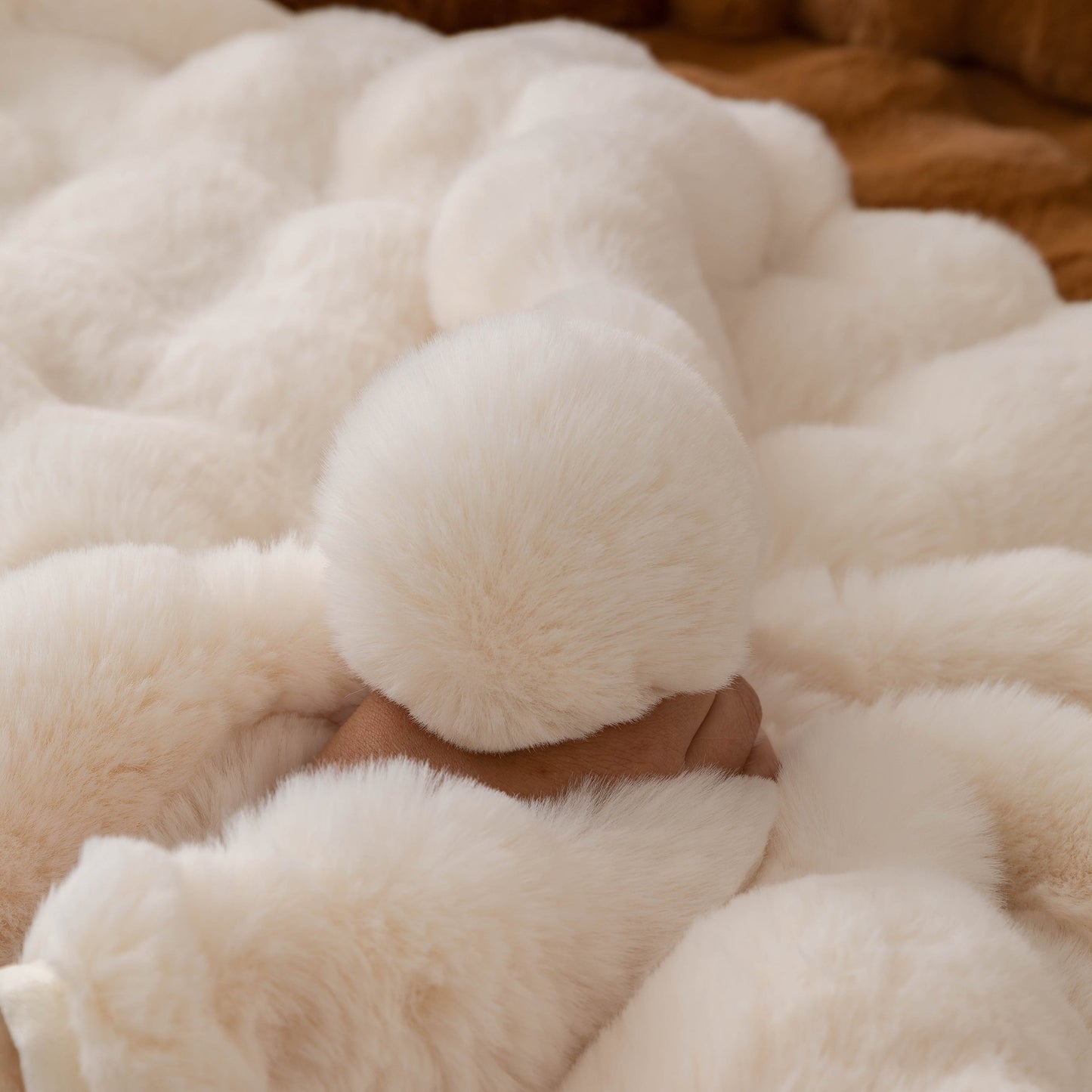 Person holding soft faux fur Thick Sofa Cushion Solid Color Faux Fur Fluffy Sofa Cushion Non-Slip Couch Covers