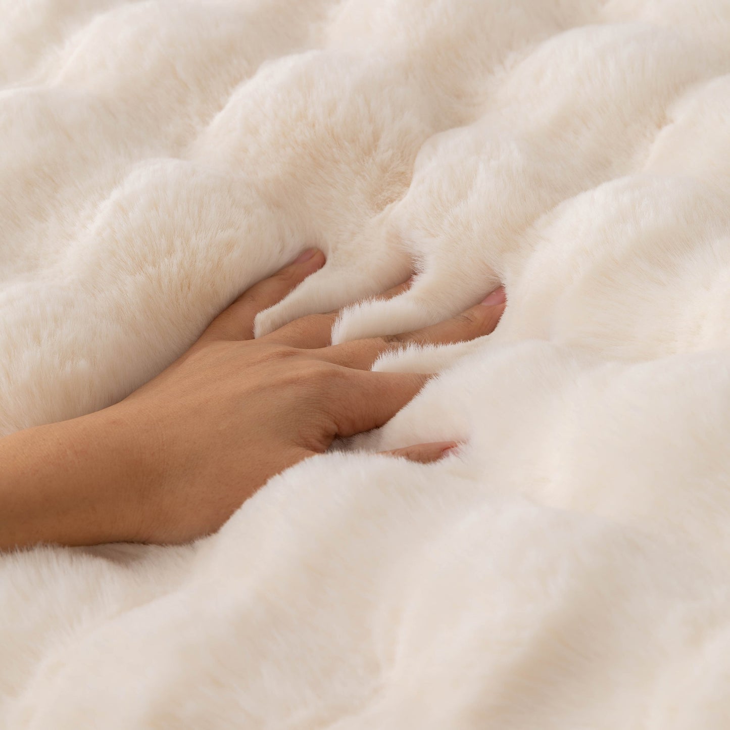 Hand touching thick sofa cushion solid color faux fur fluffy sofa cushion non-slip couch covers showing luxurious softness