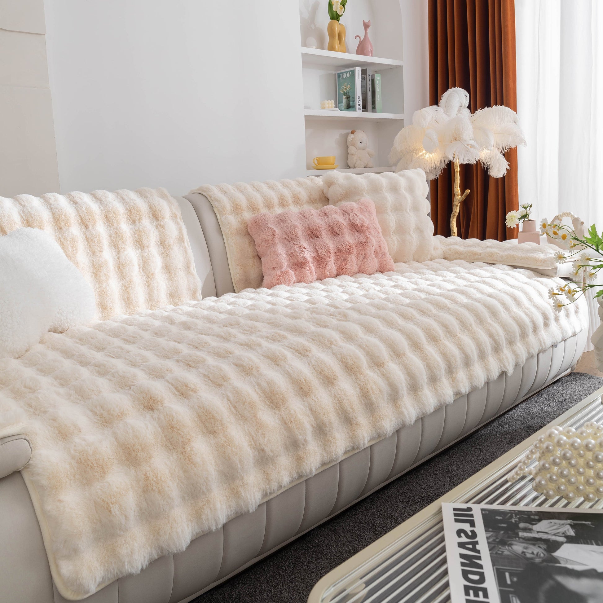 Thick Sofa Cushion Solid Color Faux Fur Fluffy Sofa Cushion Non-Slip Couch Covers on a white modern sofa in a cozy living room.