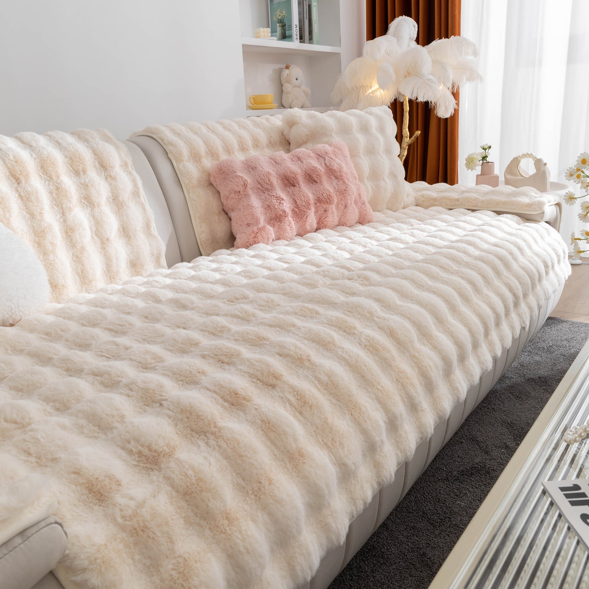 Luxurious living room with a Thick Sofa Cushion Solid Color Faux Fur Fluffy Sofa Cushion Non-Slip Couch Covers in cream color.