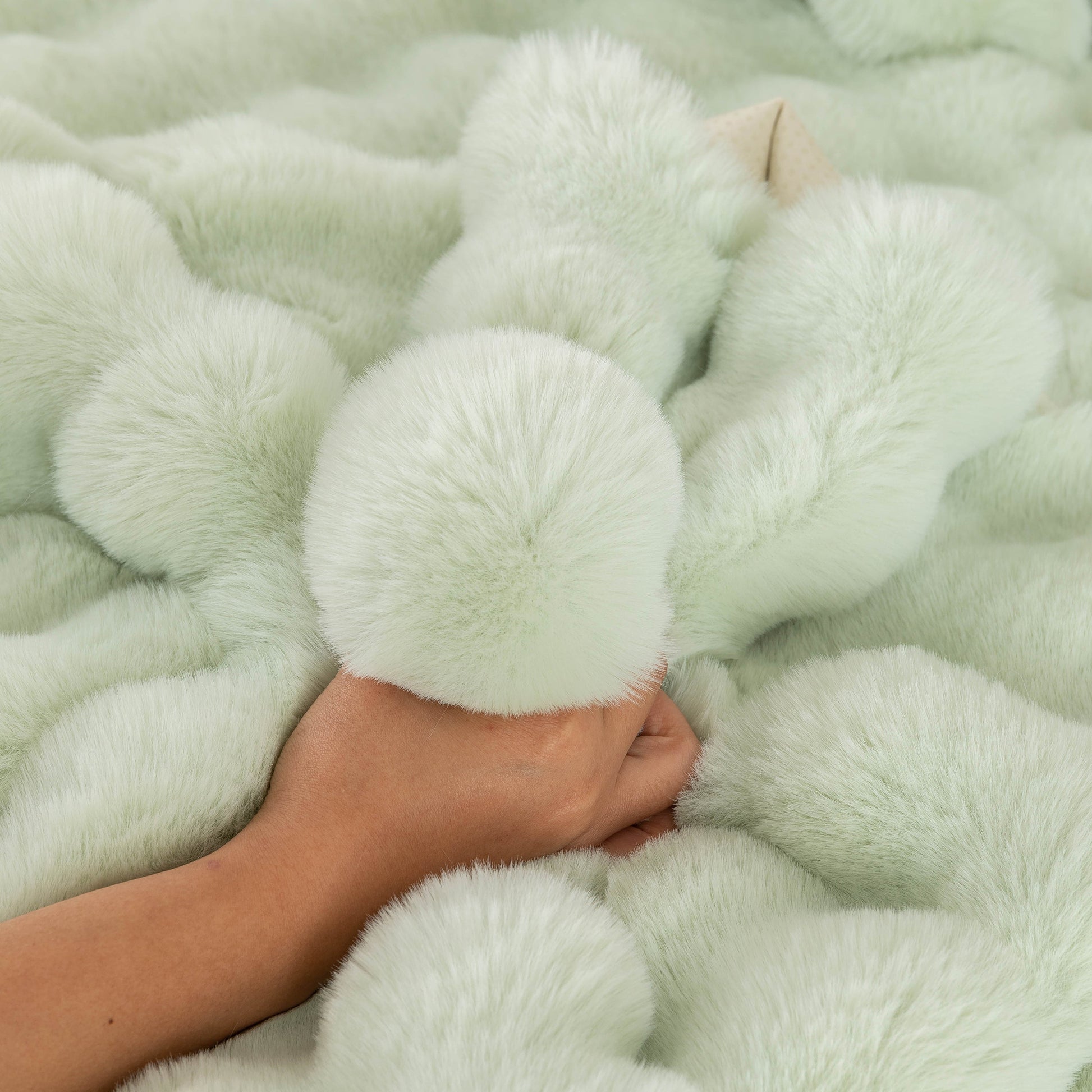 Hand touching Thick Sofa Cushion Solid Color Faux Fur Fluffy Sofa Cushion Non-Slip Couch Covers, showcasing plush texture.