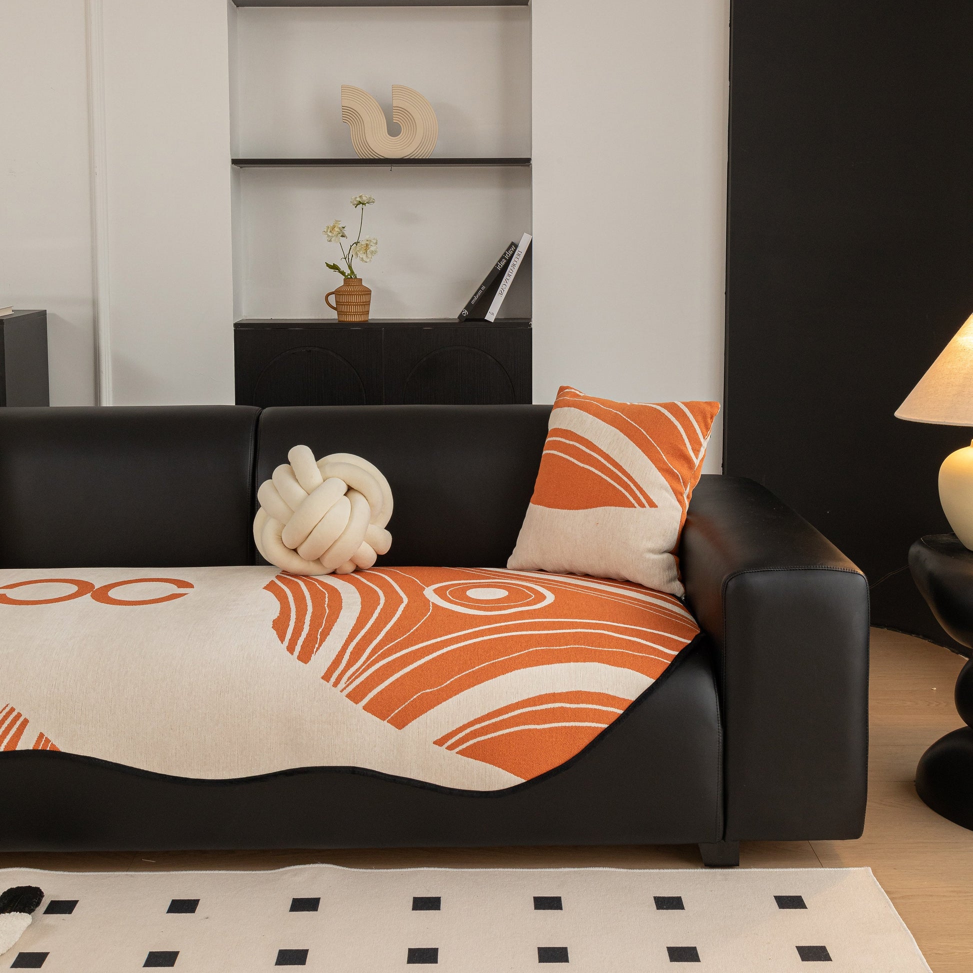 Abstract Art Sofa Cover with Wave Edge, Non Slip Couch Cover for Stylish Homes on black leather sofa