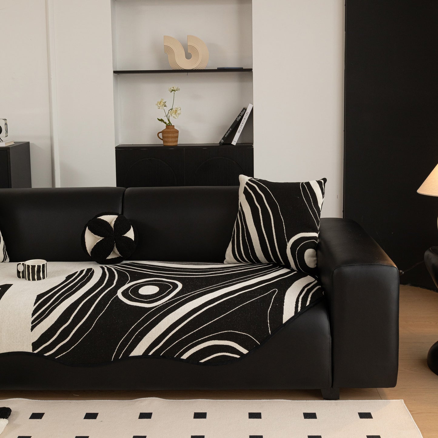 Abstract Art Sofa Cover with Wave Edge on black couch, Non Slip Couch Cover for Stylish Homes, decorative living room setting