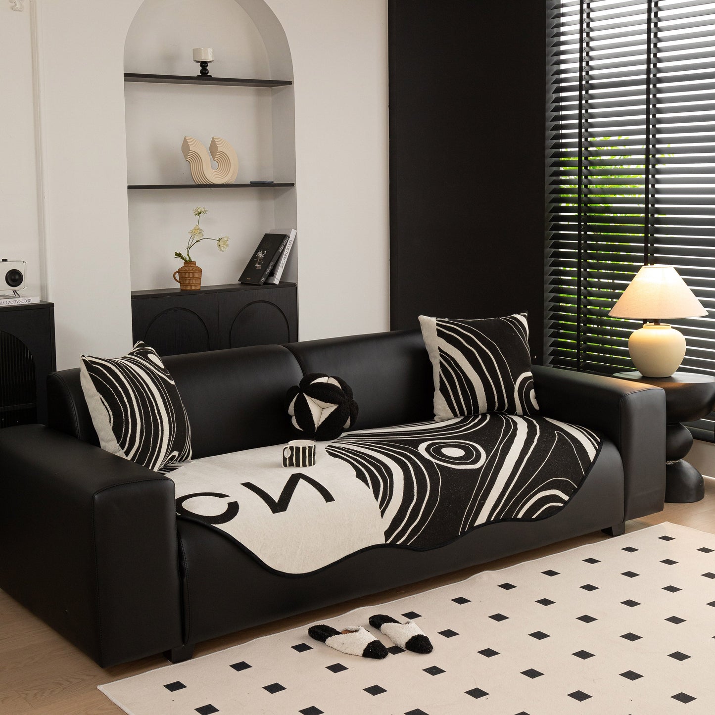 Abstract Art Sofa Cover with Wave Edge, Non Slip Couch Cover for Stylish Homes, bold pattern couch cover in black and white theme.