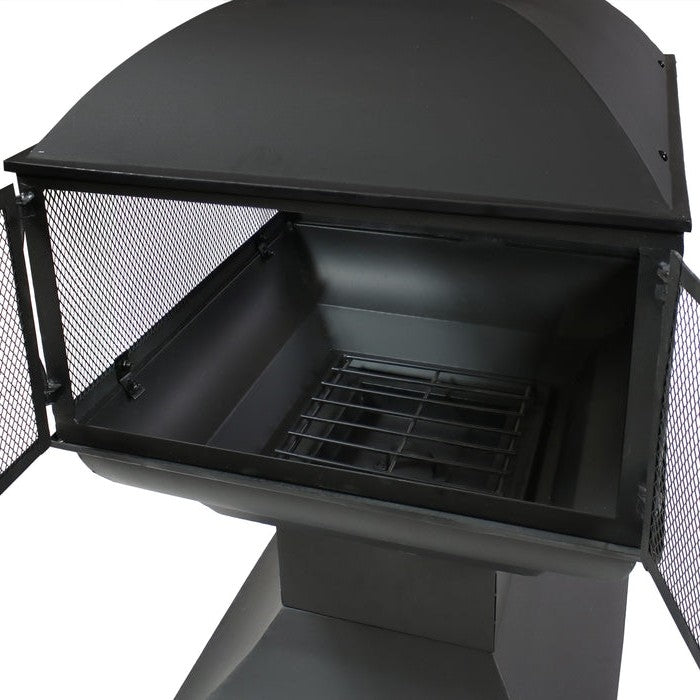 Interior view of a Large Black Outdoor Steel Chimenea Wood Burning Fire Pit with a steel log grate inside.