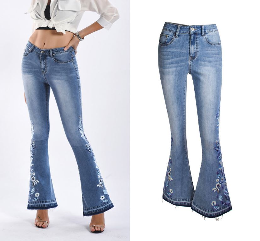 "Riley" Flared Denim Jeans in light blue with embroidered details showcasing retro street hipster style.