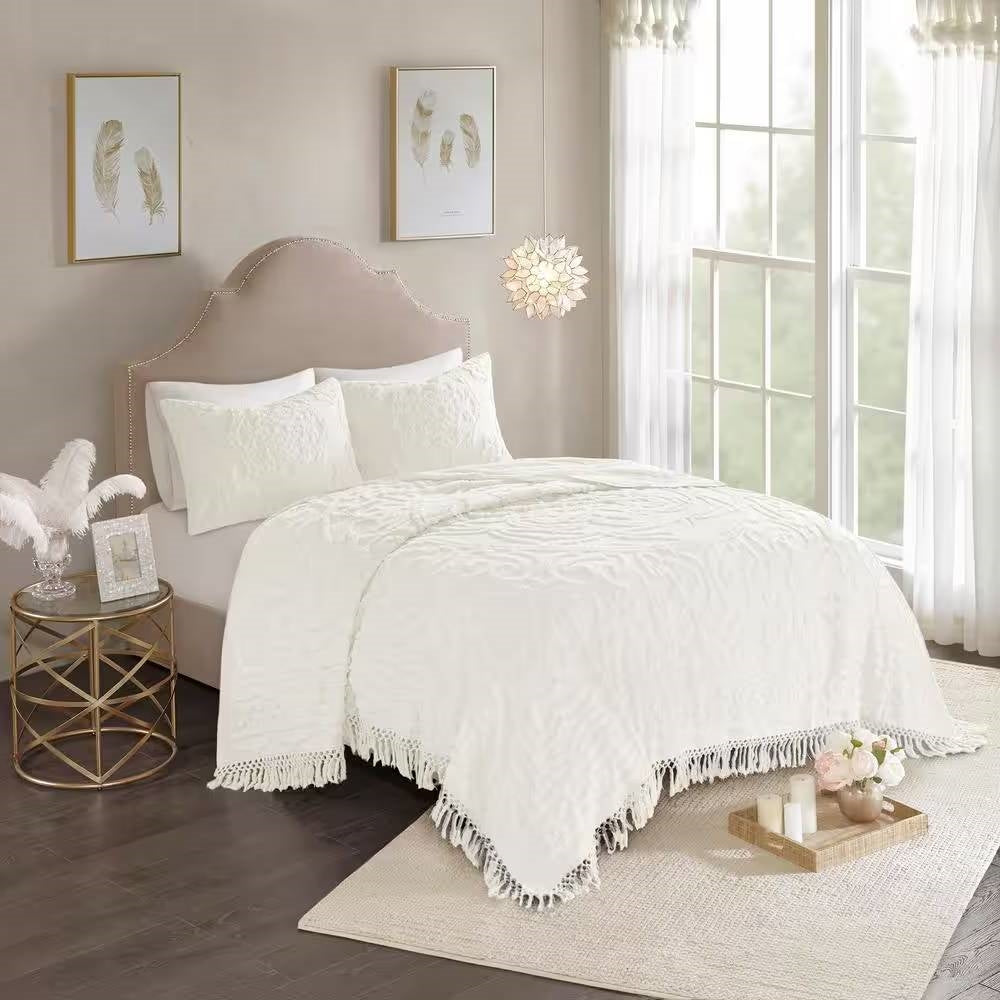 King 100-Percent Cotton Chenille Bedspread with Fringe Hem in Off-White displayed in a bright, elegant bedroom setting with matching shams.