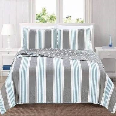 King 3 Piece Coastal Starfish Sand Dollar Grey Blue White Nautical Quilt Set on bed in beach-themed bedroom
