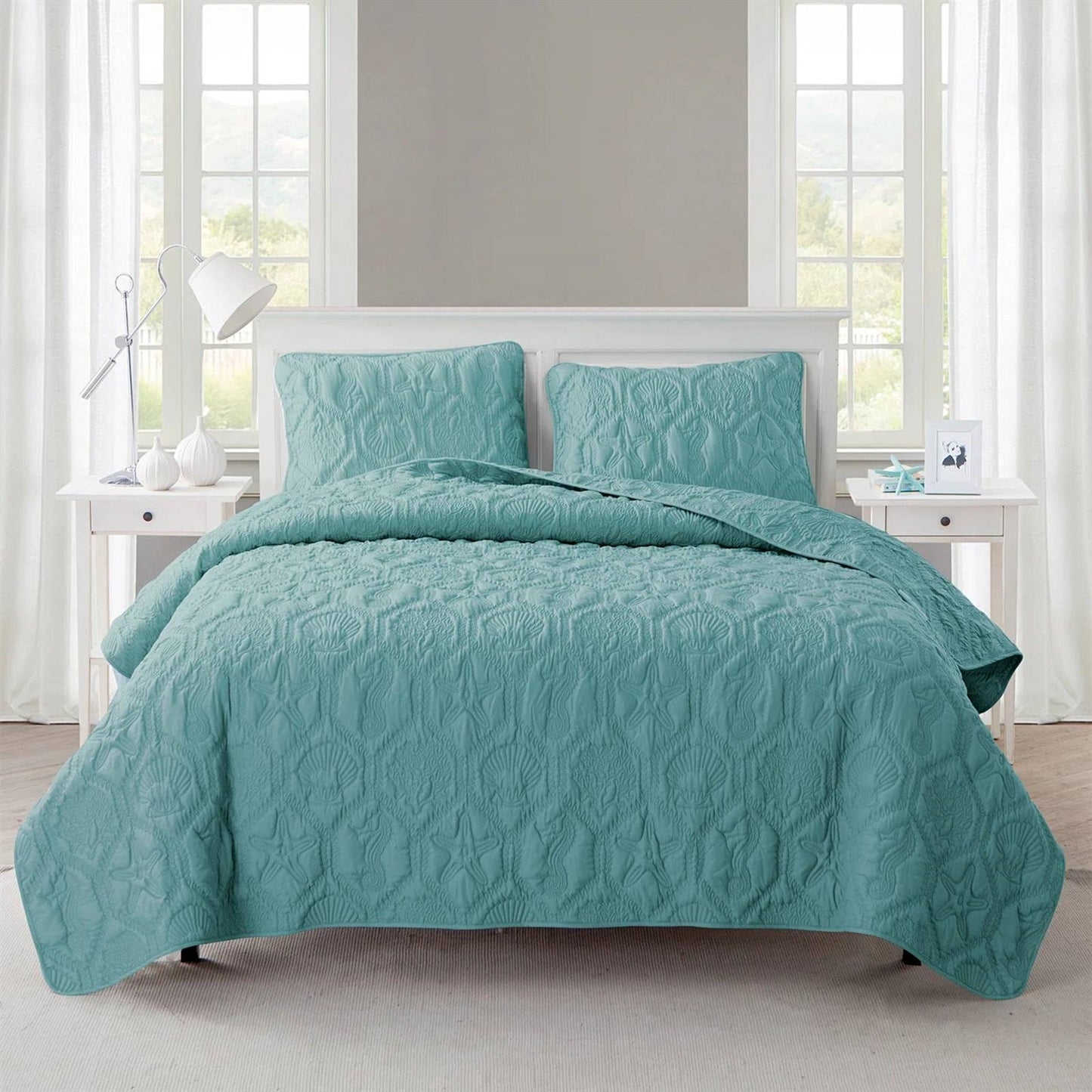 King Coastal Beach Starfish Seashell Seahorse Aqua Blue Teal 3-Piece Quilt Set on bed with white decor in bright room