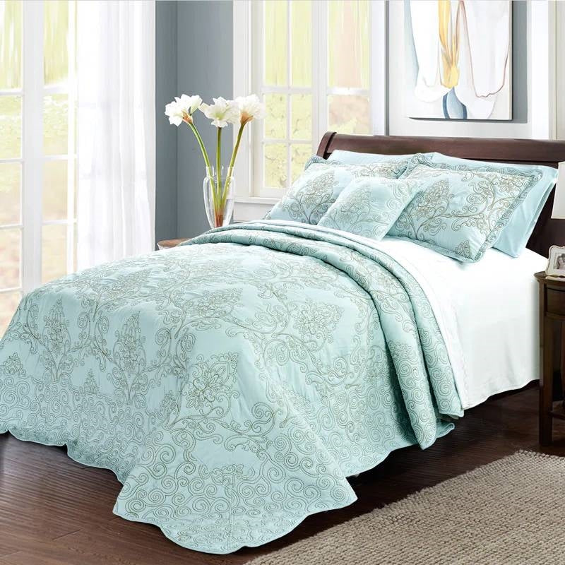 King size Light Blue Damask Embroidered 4 Piece Oversized Bedspread Set displayed in a stylish bedroom setting.