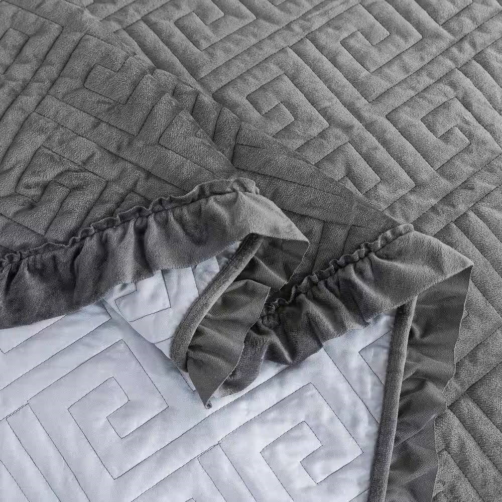 Close-up of King Gray Charcoal Velvet Microfiber Polyester Reversible 3-Piece Quilt Set with unique stitching pattern.