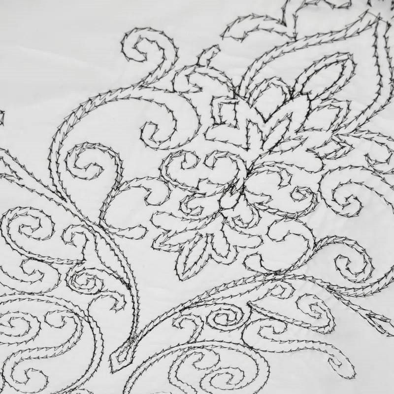 Close-up of King size White Damask Embroidered 4 Piece Oversized Bedspread Set showcasing intricate quilt embroidery design