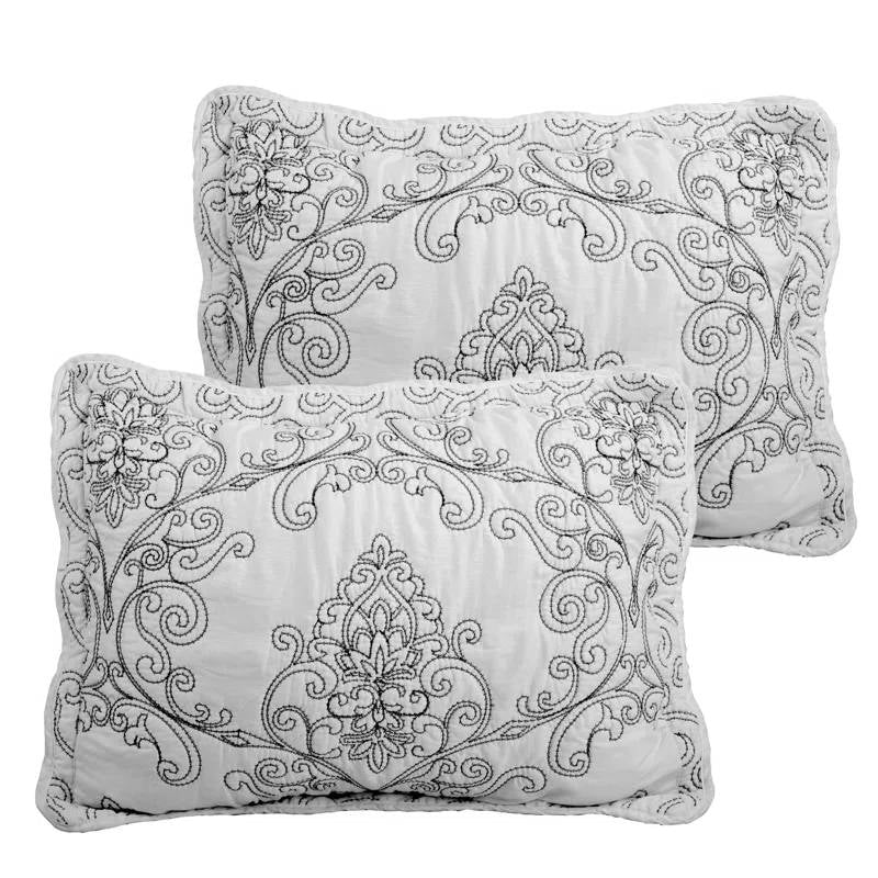 King size White Damask Embroidered 4 Piece Oversized Bedspread Set pillows with intricate quilted patterns, showcasing elegance.