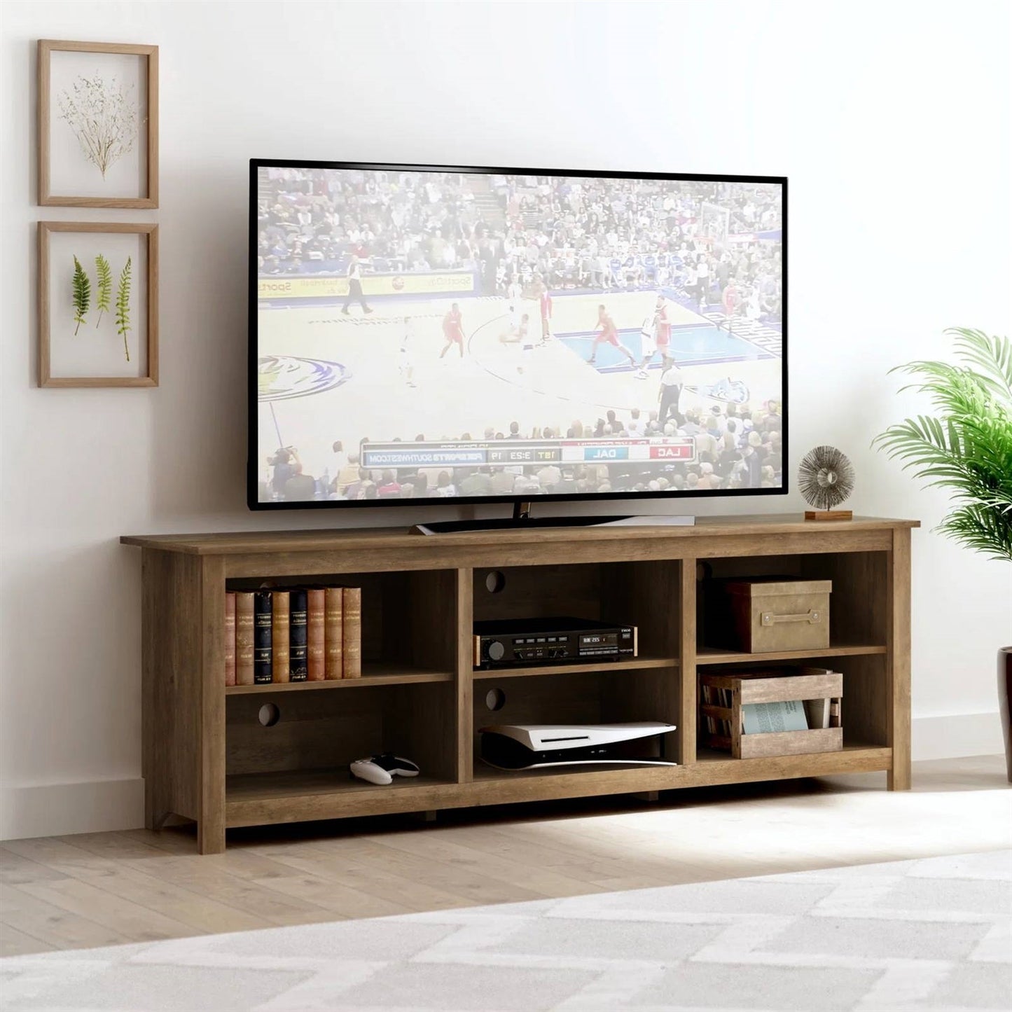 Farmhouse Style TV Stand with 6 Storage Compartments in Brown Oak Wood Finish holding a TV in a modern living room setup.
