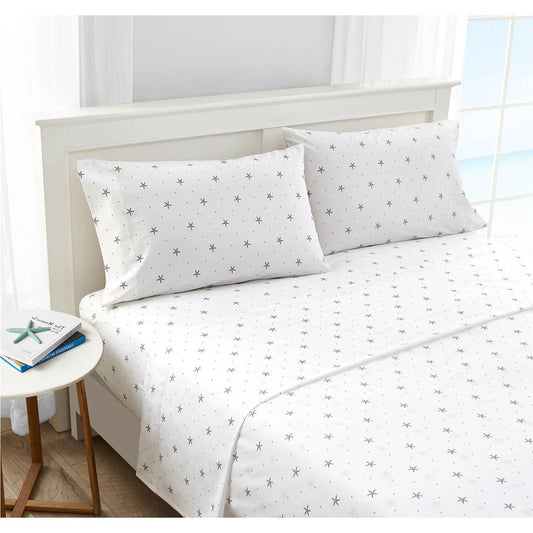 King size Coastal Beach Starfish White Navy Red 100-Percent Cotton Sheet Set on bed with matching pillowcases