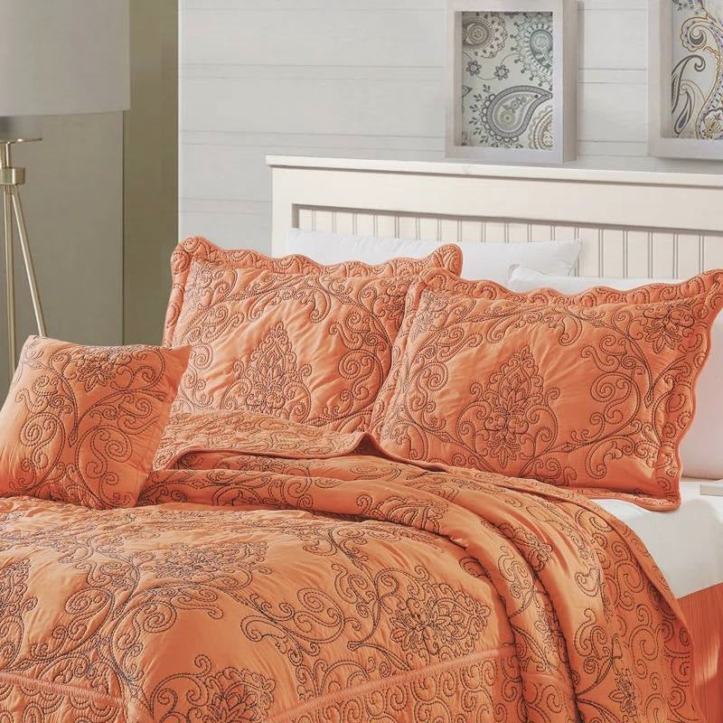 King size Orange Nectarine Damask Embroidered 4 Piece Oversized Bedspread Set on a bed