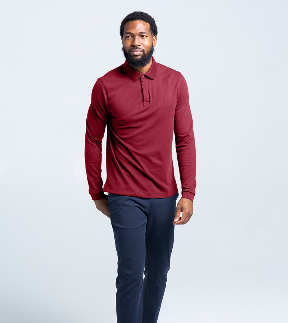 Long Sleeve Perfect Polo in maroon with StaySharp™ Collar and tailored fit, worn by a model with black pants, ideal for cooler days
