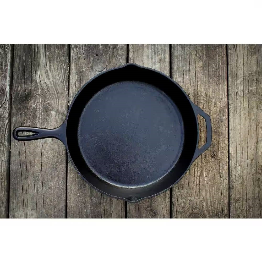 12-inch Cast Iron Skillet Frying Pan with Pour Spout - Made in the USA on wooden surface