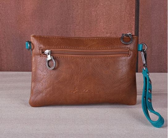 Brown leather Tassel Western Clutch & Crossbody Bag with turquoise strap, rustic design, and metal zipper accents.
