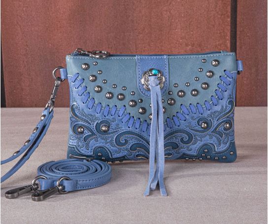 Tassel Western Clutch & Crossbody Bag with embroidered design and turquoise concho tassels, featuring antique silver studs.