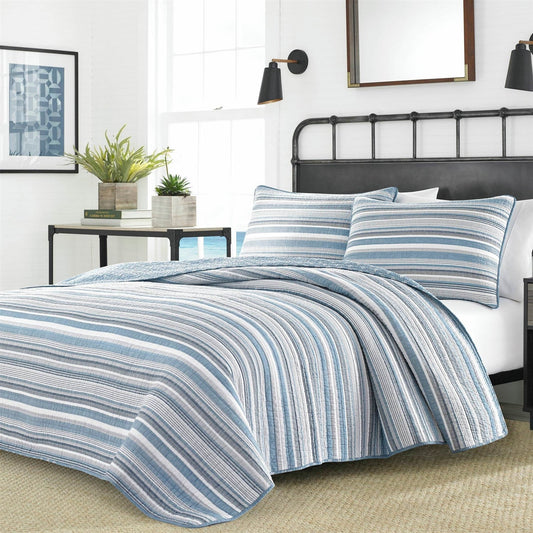 Full/Queen 3 Piece Nautical Anchor Blues 100-Percent Cotton Reversible Quilt Set on bed in stylish bedroom setting
